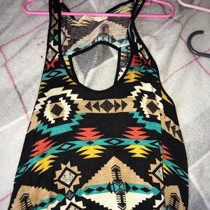 Tank top with designs.
